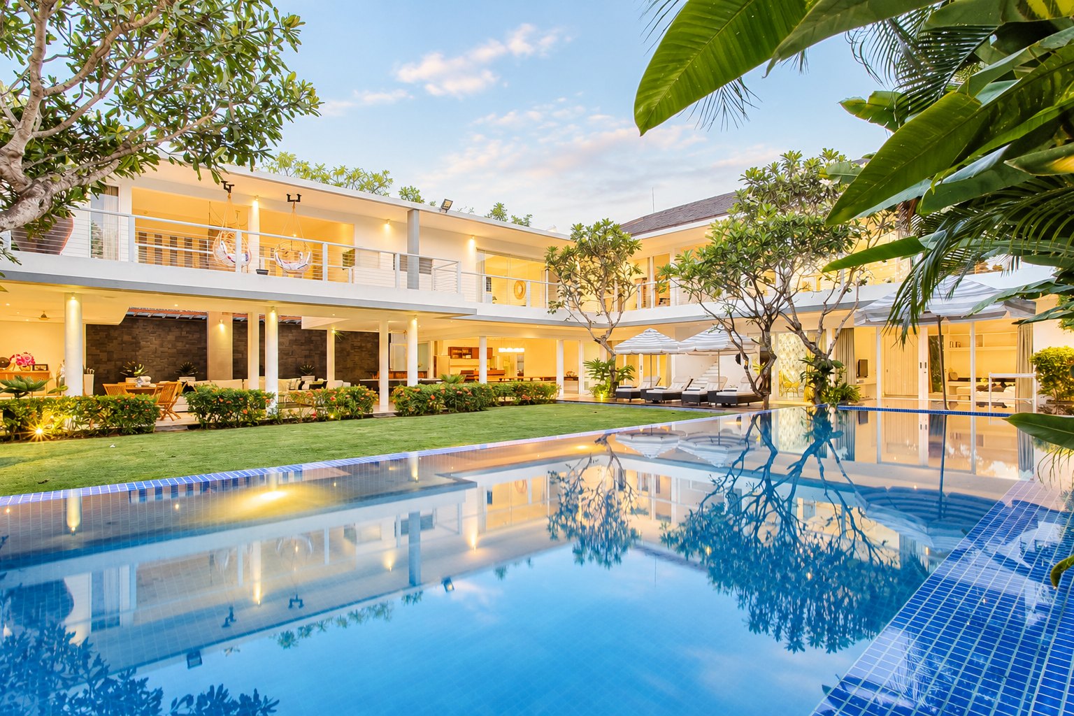 CassaMia Bali private villa and 22-metre pool at dusk, Jimbaran