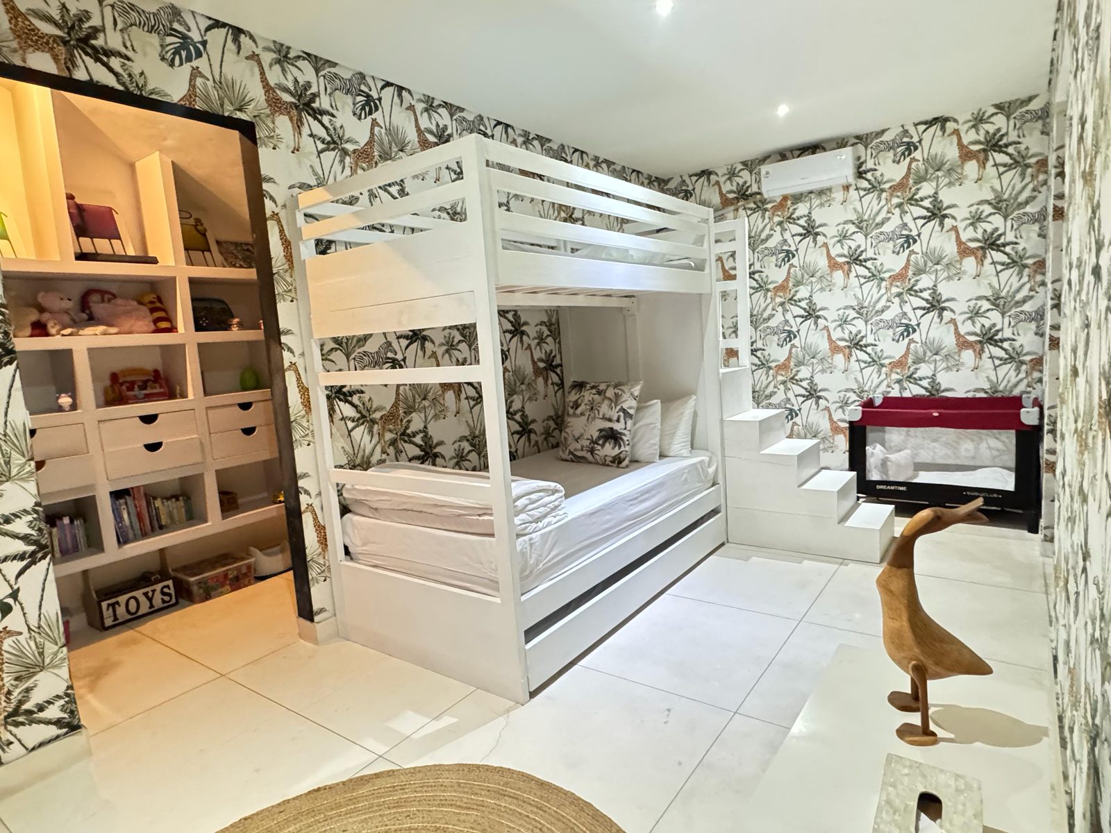 Kids safari-themed bedroom at CassaMia Bali villa